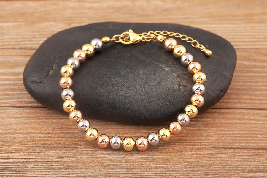 Gold Bead Charm Bracelet
