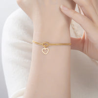 Gold knot Heart Charm Bracelet